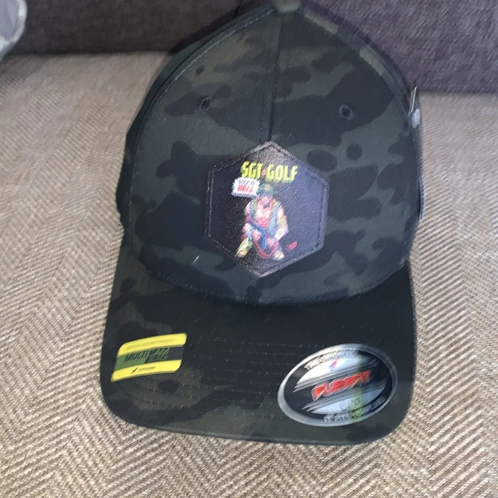 New with Tags Yupoong Sgt Golf Golf is Hell mulitcam Hat size L/XL. Very nice.